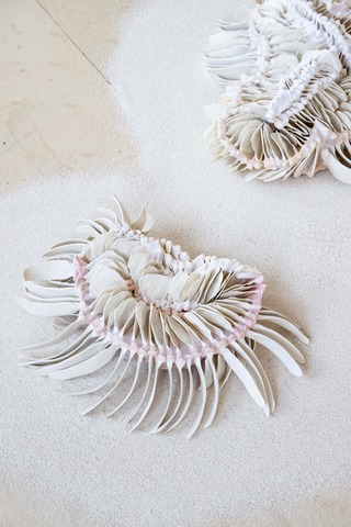 Almost Blooming VI and VII, 
Hand shaped porcelain elements, dyed nylon fabric, tied, 40 x 35 x 9 cm45 x 45 x 12 cm, Exhibition „A glitch in the forest“ at Gyldenpris Kunsthall, Bergen (NO) , 2025,
Photo: Thor Brødreskift
